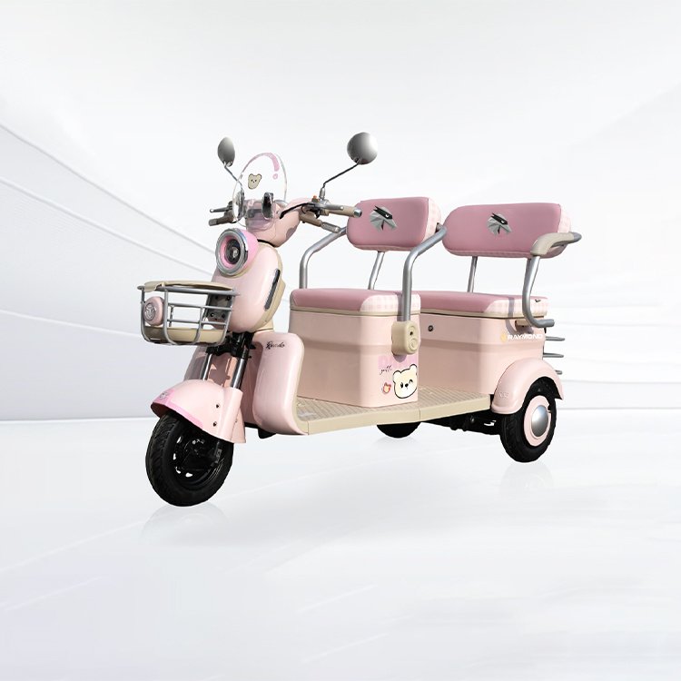 Xingguang compact leisure electric passenger tricycle pink 3‑wheel electric vehicle